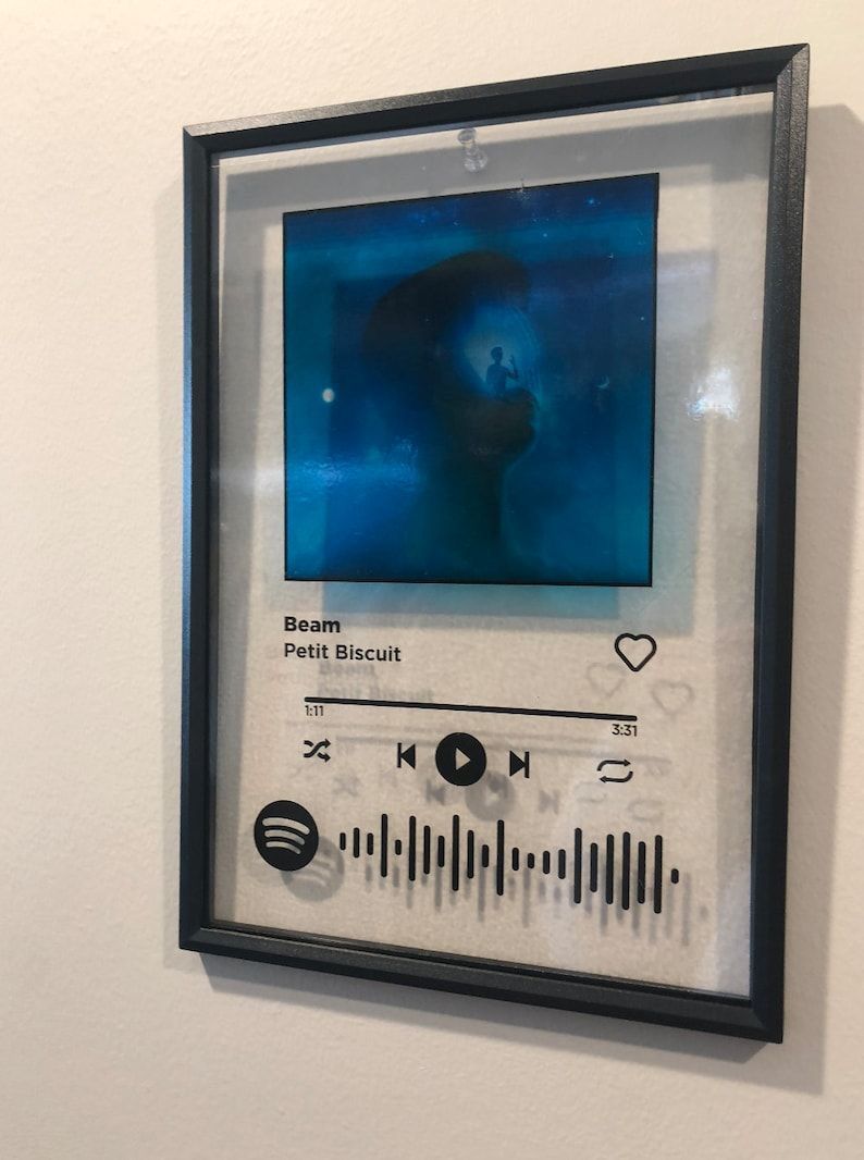 Acrylic Spotify-style plaque — Beam by Petit Biscuit, framed on wall